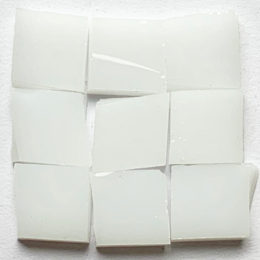 Detail of Tiffany Glacier White with nine glass tiles