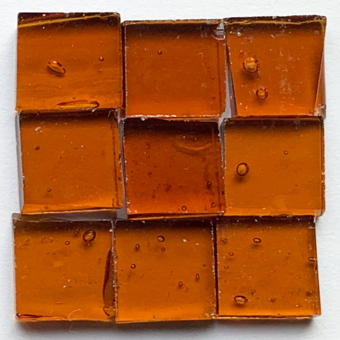Detail of Tiffany Glacier Marron with nine glass tiles