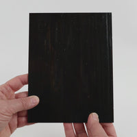Video of the Tobacco glass plate in opaque brown, 15x19cm, held up and tilted to show its pattern and transparency