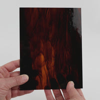 Video of the Beach glass plate in semitransparant brown, 15x19cm, held up and tilted to show its pattern and transparency